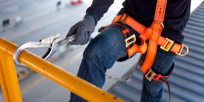 Construction workers with safety vests and helmets